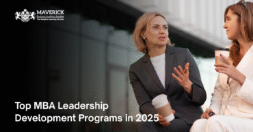 Two professional women discussing leadership over coffee outside an office building, promoting Top MBA Leadership Development Programs in 2025 by Maverick Business Academy London
