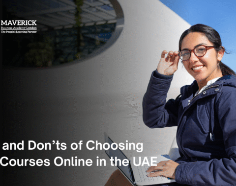 Smiling female student using a laptop outdoors, representing online PhD courses in the UAE – Maverick Business Academy London.